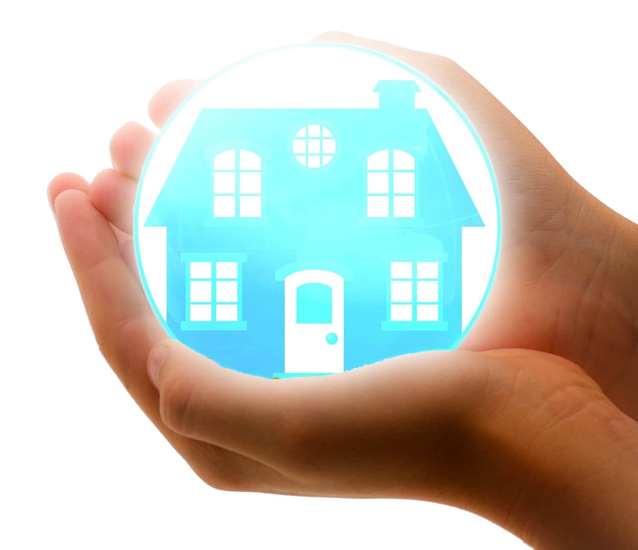 Glowing house held as a fragile ball in a pair of hands